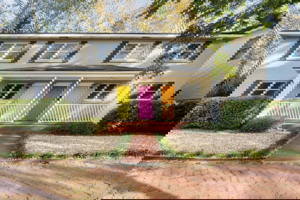 Vibrant, Colorful Condo Building With Backyard Firepit And Games - thumb 1